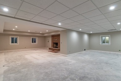 Welcome to this elegant 4-bedroom, 4.2-bath home, situated on a on Royal Melbourne in Illinois - for sale on GolfHomes.com, golf home, golf lot