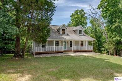 Welcome to this beautiful Cape Cod-style home nestled in on Doe Valley Country Club in Kentucky - for sale on GolfHomes.com, golf home, golf lot