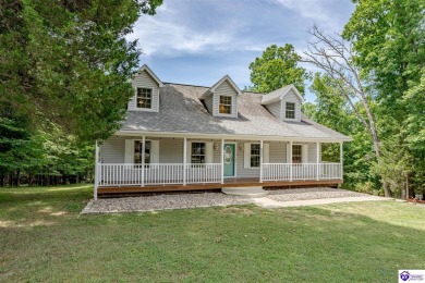 Welcome to this beautiful Cape Cod-style home nestled in on Doe Valley Country Club in Kentucky - for sale on GolfHomes.com, golf home, golf lot