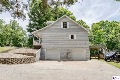 Welcome to this beautiful Cape Cod-style home nestled in on Doe Valley Country Club in Kentucky - for sale on GolfHomes.com, golf home, golf lot