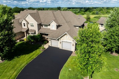 Crafted by Lowell Custom Homes this Geneva National townhome on Geneva National Golf Club in Wisconsin - for sale on GolfHomes.com, golf home, golf lot