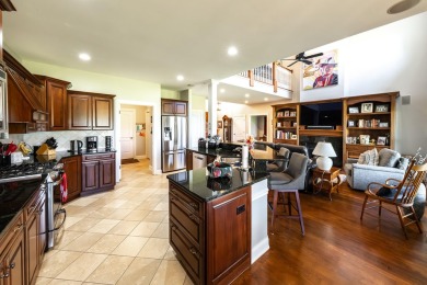 Crafted by Lowell Custom Homes this Geneva National townhome on Geneva National Golf Club in Wisconsin - for sale on GolfHomes.com, golf home, golf lot