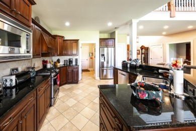 Crafted by Lowell Custom Homes this Geneva National townhome on Geneva National Golf Club in Wisconsin - for sale on GolfHomes.com, golf home, golf lot