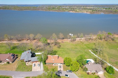 Take a look at this stunning lakefront property located in the on Cherokee Grove Golf Club, Inc in Oklahoma - for sale on GolfHomes.com, golf home, golf lot