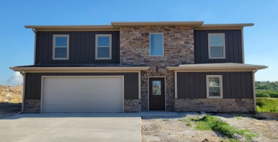 Brand new construction. Located in Hidden Bridge Ranch across on Hidden Bridge Golf Club in Wyoming - for sale on GolfHomes.com, golf home, golf lot