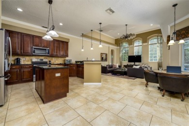 Ideally located in the gated Hunters Green Golf Course community on Hunters Green Country Club in Florida - for sale on GolfHomes.com, golf home, golf lot