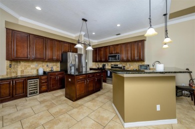 Ideally located in the gated Hunters Green Golf Course community on Hunters Green Country Club in Florida - for sale on GolfHomes.com, golf home, golf lot