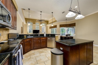 Ideally located in the gated Hunters Green Golf Course community on Hunters Green Country Club in Florida - for sale on GolfHomes.com, golf home, golf lot