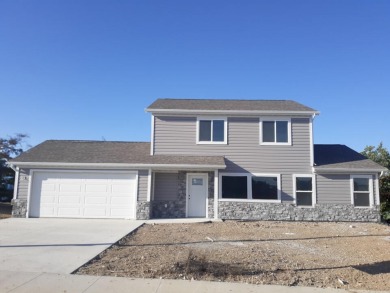 Brand new construction. Located in Hidden Bridge Ranch across on Hidden Bridge Golf Club in Wyoming - for sale on GolfHomes.com, golf home, golf lot