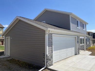 Brand new construction. Located in Hidden Bridge Ranch across on Hidden Bridge Golf Club in Wyoming - for sale on GolfHomes.com, golf home, golf lot