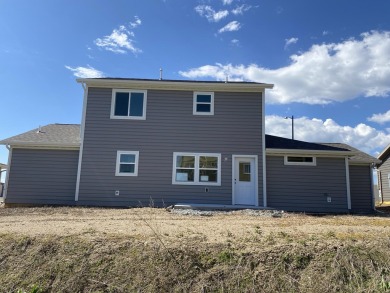 Brand new construction. Located in Hidden Bridge Ranch across on Hidden Bridge Golf Club in Wyoming - for sale on GolfHomes.com, golf home, golf lot
