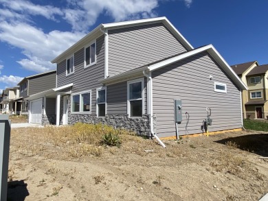 Brand new construction. Located in Hidden Bridge Ranch across on Hidden Bridge Golf Club in Wyoming - for sale on GolfHomes.com, golf home, golf lot