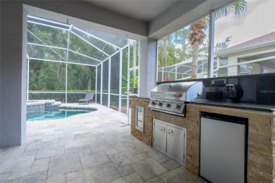 Ideally located in the gated Hunters Green Golf Course community on Hunters Green Country Club in Florida - for sale on GolfHomes.com, golf home, golf lot