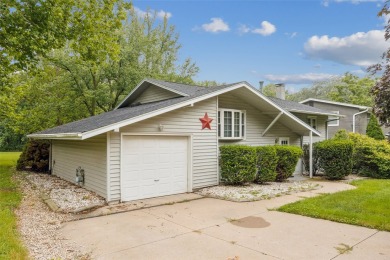 Welcome to this spacious and beautifully maintained 3-bedroom, 1 on Ottumwa Country Club in Iowa - for sale on GolfHomes.com, golf home, golf lot