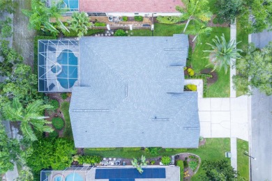 Ideally located in the gated Hunters Green Golf Course community on Hunters Green Country Club in Florida - for sale on GolfHomes.com, golf home, golf lot