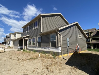 Brand new construction. Located in Hidden Bridge Ranch across on Hidden Bridge Golf Club in Wyoming - for sale on GolfHomes.com, golf home, golf lot