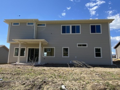 Brand new construction. Located in Hidden Bridge Ranch across on Hidden Bridge Golf Club in Wyoming - for sale on GolfHomes.com, golf home, golf lot