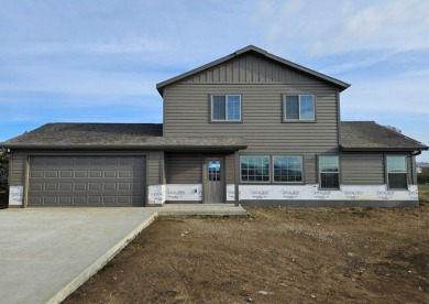 Brand new construction. Located in Hidden Bridge Ranch across on Hidden Bridge Golf Club in Wyoming - for sale on GolfHomes.com, golf home, golf lot