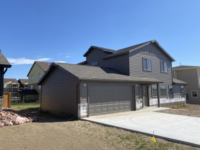 Brand new construction. Located in Hidden Bridge Ranch across on Hidden Bridge Golf Club in Wyoming - for sale on GolfHomes.com, golf home, golf lot