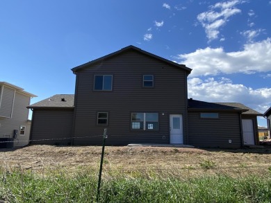 Brand new construction. Located in Hidden Bridge Ranch across on Hidden Bridge Golf Club in Wyoming - for sale on GolfHomes.com, golf home, golf lot