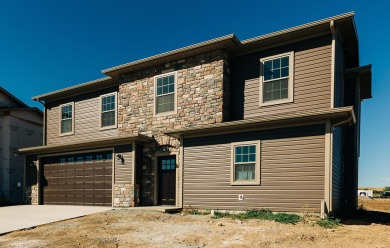 Brand new construction. Located in Hidden Bridge Ranch across on Hidden Bridge Golf Club in Wyoming - for sale on GolfHomes.com, golf home, golf lot