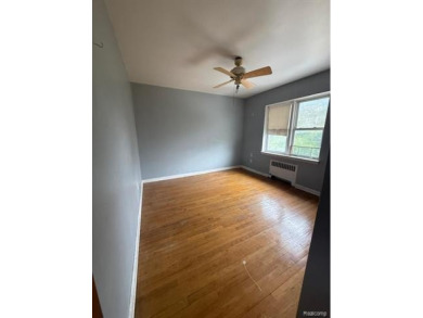 Charming 2-Bedroom Condominium in the perfect location. This on Detroit Golf Club  in Michigan - for sale on GolfHomes.com, golf home, golf lot