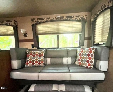 Price reduction by 10K! One of the nicest properties at the on River Golf and County Club at Lake Royale in North Carolina - for sale on GolfHomes.com, golf home, golf lot