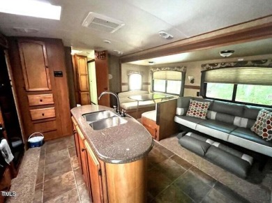 Price reduction by 10K! One of the nicest properties at the on River Golf and County Club at Lake Royale in North Carolina - for sale on GolfHomes.com, golf home, golf lot