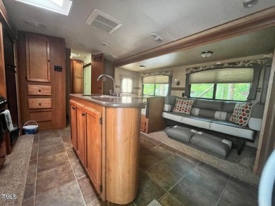 Price reduction by 10K! One of the nicest properties at the on River Golf and County Club at Lake Royale in North Carolina - for sale on GolfHomes.com, golf home, golf lot