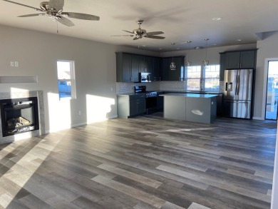 Brand new construction. Located in Hidden Bridge Ranch across on Hidden Bridge Golf Club in Wyoming - for sale on GolfHomes.com, golf home, golf lot