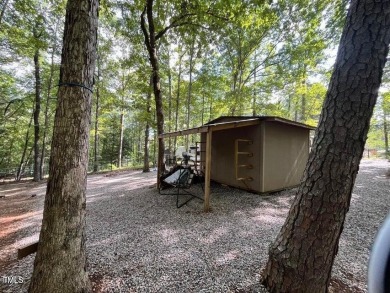 Price reduction by 10K! One of the nicest properties at the on River Golf and County Club at Lake Royale in North Carolina - for sale on GolfHomes.com, golf home, golf lot