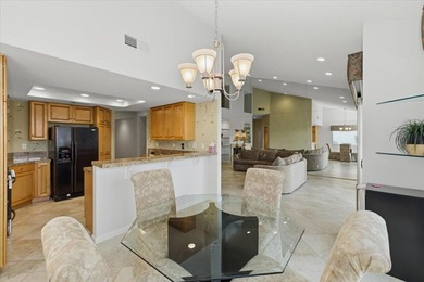 The seller truly delivers on the promise of a rose garden on Palm Valley Country Club in California - for sale on GolfHomes.com, golf home, golf lot