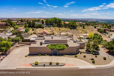 Quintessential Pueblo Revival architecture in Northern New on Pinon Hills Golf Course in New Mexico - for sale on GolfHomes.com, golf home, golf lot