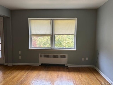 Charming 2-Bedroom Condominium in the perfect location. This on Detroit Golf Club  in Michigan - for sale on GolfHomes.com, golf home, golf lot