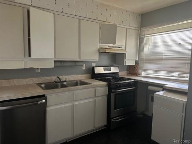 Charming 2-Bedroom Condominium in the perfect location. This on Detroit Golf Club  in Michigan - for sale on GolfHomes.com, golf home, golf lot