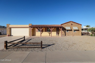 Nestled in a prime location, this beautiful Spanish style home on PalmBrook Country Club in Arizona - for sale on GolfHomes.com, golf home, golf lot
