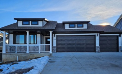 Brand new construction. Located in Hidden Bridge Ranch across on Hidden Bridge Golf Club in Wyoming - for sale on GolfHomes.com, golf home, golf lot