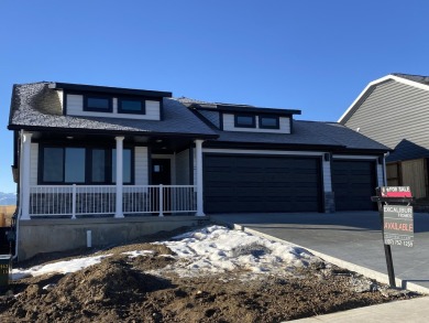 Brand new construction. Located in Hidden Bridge Ranch across on Hidden Bridge Golf Club in Wyoming - for sale on GolfHomes.com, golf home, golf lot