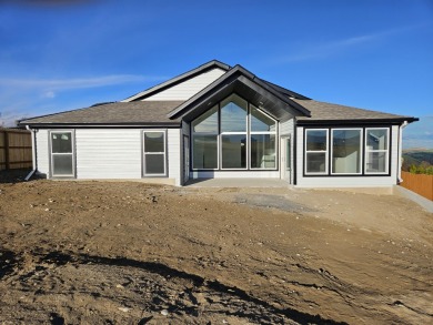 Brand new construction. Located in Hidden Bridge Ranch across on Hidden Bridge Golf Club in Wyoming - for sale on GolfHomes.com, golf home, golf lot