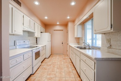 Nestled in a prime location, this beautiful Spanish style home on PalmBrook Country Club in Arizona - for sale on GolfHomes.com, golf home, golf lot