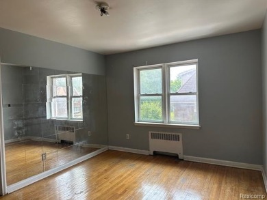 Charming 2-Bedroom Condominium in the perfect location. This on Detroit Golf Club  in Michigan - for sale on GolfHomes.com, golf home, golf lot
