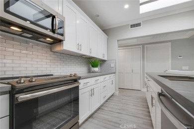 The minute you walk into this gorgeous re-designed three-bedroom on Laguna Woods Village Golf Course in California - for sale on GolfHomes.com, golf home, golf lot