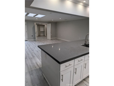The minute you walk into this gorgeous re-designed three-bedroom on Laguna Woods Village Golf Course in California - for sale on GolfHomes.com, golf home, golf lot