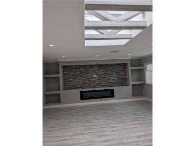 The minute you walk into this gorgeous re-designed three-bedroom on Laguna Woods Village Golf Course in California - for sale on GolfHomes.com, golf home, golf lot