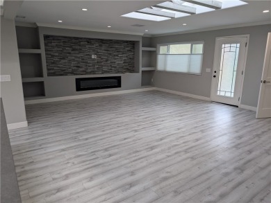 The minute you walk into this gorgeous re-designed three-bedroom on Laguna Woods Village Golf Course in California - for sale on GolfHomes.com, golf home, golf lot