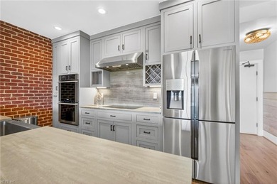 Experience premier coastal living in this elevator-accessible on Bay Creek Golf Club in Virginia - for sale on GolfHomes.com, golf home, golf lot