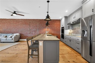 Experience premier coastal living in this elevator-accessible on Bay Creek Golf Club in Virginia - for sale on GolfHomes.com, golf home, golf lot