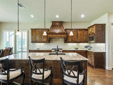 Embrace luxury living in this custom Oakdale home in the golf on The Bridges Golf Club in Texas - for sale on GolfHomes.com, golf home, golf lot