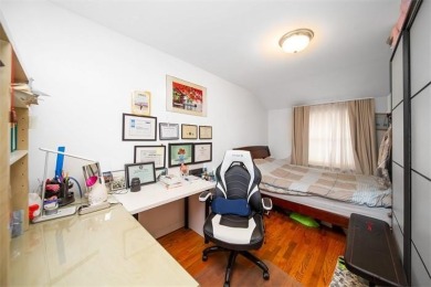 Welcome to this charming all-brick single-family home, perfectly on Douglaston Park Golf Course in New York - for sale on GolfHomes.com, golf home, golf lot
