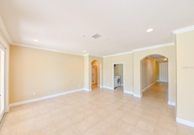 This spacious 4 bedroom, 3.5 bathroom, 3 car garage, 2 story on Heritage Harbor Golf and Country Club in Florida - for sale on GolfHomes.com, golf home, golf lot